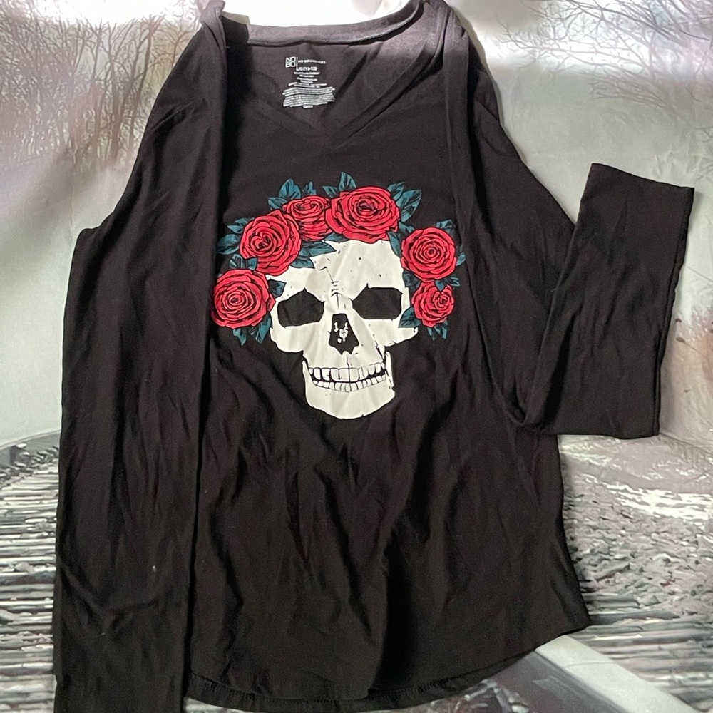 Black long sleeved tee with skull and flowers screen print